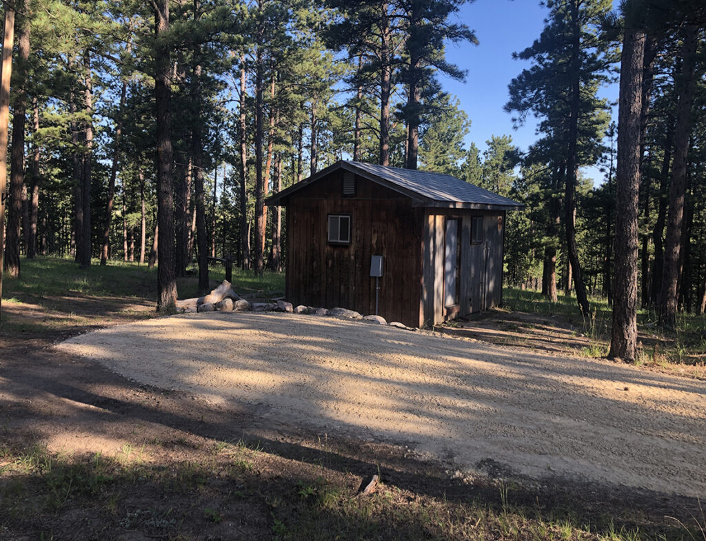 RV site showing exterior of bath house